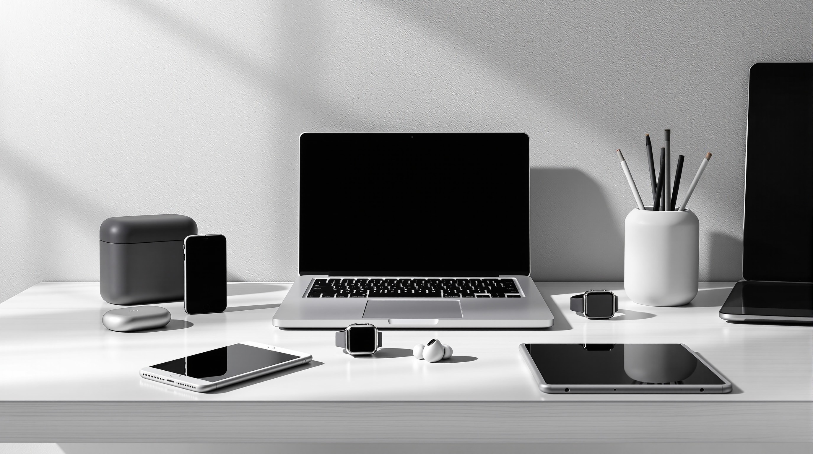 Modern technology devices including smartphone, tablet, and laptop